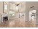 Open living room with high ceilings and kitchen view at 9382 E Aster Dr, Scottsdale, AZ 85260