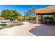 Large patio area with seating and pool views at 9382 E Aster Dr, Scottsdale, AZ 85260