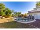 Relaxing pool area with a spa and outdoor patio at 9382 E Aster Dr, Scottsdale, AZ 85260