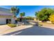 Inviting kidney-shaped pool with safety fence at 9382 E Aster Dr, Scottsdale, AZ 85260