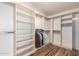 Large walk-in closet with ample shelving and hanging space at 9382 E Aster Dr, Scottsdale, AZ 85260
