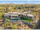 Luxury home with a large pool and stunning views of the desert landscape at 9940 E Aleka Way, Scottsdale, AZ 85262