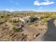 Luxury home with a private drive and a stunning desert landscape view at 9940 E Aleka Way, Scottsdale, AZ 85262