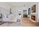 Spacious bedroom with fireplace and large windows at 9940 E Aleka Way, Scottsdale, AZ 85262