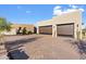 Two-car garage with modern wood doors at 9940 E Aleka Way, Scottsdale, AZ 85262