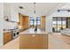 Modern kitchen with large island and top of the line appliances at 9940 E Aleka Way, Scottsdale, AZ 85262