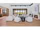 Bright living room with fireplace and large windows at 9940 E Aleka Way, Scottsdale, AZ 85262