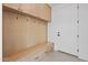 Functional mudroom with built-in bench and storage at 9940 E Aleka Way, Scottsdale, AZ 85262