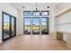 Spacious home office with large windows and custom cabinetry at 9940 E Aleka Way, Scottsdale, AZ 85262