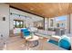 Relaxing outdoor patio with comfortable seating and wood ceilings at 9940 E Aleka Way, Scottsdale, AZ 85262
