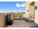 Backyard patio featuring a water feature and desert landscape at 9940 E Aleka Way, Scottsdale, AZ 85262