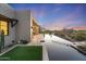 Expansive pool area with sunset views and landscaping at 9940 E Aleka Way, Scottsdale, AZ 85262
