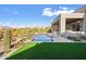 Resort-style backyard oasis featuring a pristine pool and modern landscaping at 9940 E Aleka Way, Scottsdale, AZ 85262