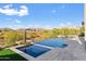 Luxury infinity pool with spa and mountain views at 9940 E Aleka Way, Scottsdale, AZ 85262