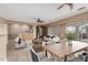 Spacious dining area with wood table and seating for six at 17436 W Navajo St, Goodyear, AZ 85338