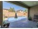 Covered patio overlooking a sparkling pool, perfect for outdoor entertaining at 19606 W Grant St, Buckeye, AZ 85326