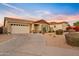 Single-story home with landscaped yard and driveway at 22274 E Cherrywood --, Queen Creek, AZ 85142