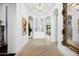 Bright entry hall with high ceilings and decorative niche at 2335 E Plum St, Gilbert, AZ 85298