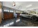 Finished garage with epoxy flooring and plenty of storage space at 2335 E Plum St, Gilbert, AZ 85298
