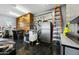 Garage with storage cabinets, shelving, and room for multiple vehicles at 2335 E Plum St, Gilbert, AZ 85298