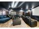Home theater with comfortable seating and large projection screen at 2335 E Plum St, Gilbert, AZ 85298