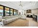 Open kitchen with large island, stainless steel appliances, and custom cabinetry at 2335 E Plum St, Gilbert, AZ 85298