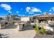 Outdoor kitchen with built-in grill and fireplace at 2335 E Plum St, Gilbert, AZ 85298