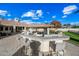 Outdoor kitchen with bar seating and built-in grill, perfect for entertaining at 2335 E Plum St, Gilbert, AZ 85298