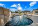 Luxury pool with rock waterfall and swim-up grotto at 2335 E Plum St, Gilbert, AZ 85298