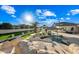 Stunning pool and spa with a rock waterfall feature at 2335 E Plum St, Gilbert, AZ 85298