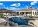 Relaxing pool area with patio furniture and fountains at 2335 E Plum St, Gilbert, AZ 85298