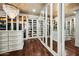 Spacious Primary closet with ample built-in shelving and drawers at 2335 E Plum St, Gilbert, AZ 85298