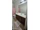 Bathroom with a vanity, shower/tub combo, and tile flooring at 25422 W Maldonado Ct, Buckeye, AZ 85326