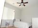 Bedroom with a twin bed and ceiling fan at 25422 W Maldonado Ct, Buckeye, AZ 85326