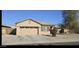 One-story house with a two-car garage and desert landscaping at 25422 W Maldonado Ct, Buckeye, AZ 85326