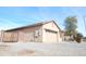 Single car garage with neutral colored door at 25422 W Maldonado Ct, Buckeye, AZ 85326