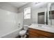 Clean bathroom with a tub, toilet and vanity at 41208 W Bravo Dr, Maricopa, AZ 85138