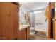 Clean bathroom with shower stall, toilet and wooden vanity at 535 S Alma School Rd # 23, Mesa, AZ 85210