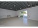 Spacious unfinished basement with sliding door access to backyard at 6312 N 13Th St, Phoenix, AZ 85014
