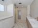 Elegant bathroom with double vanity and herringbone floors at 6312 N 13Th St, Phoenix, AZ 85014