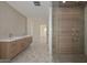 Spa-like bathroom with walk-in shower and herringbone floors at 6312 N 13Th St, Phoenix, AZ 85014