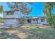 White two-story house with attached garage and landscaped lawn at 6312 N 13Th St, Phoenix, AZ 85014