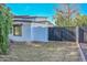 Home's exterior showcasing a modern design and private gate at 6312 N 13Th St, Phoenix, AZ 85014