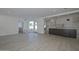 Open living room and kitchen area with light wood-look floors at 6312 N 13Th St, Phoenix, AZ 85014