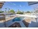 Inviting kidney-shaped pool with surrounding patio and spa at 6312 N 13Th St, Phoenix, AZ 85014