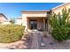 Landscaped backyard with paved pathway at 846 N Pueblo Dr # 113, Casa Grande, AZ 85122