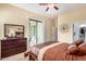 Relaxing bedroom with private patio access and dresser at 846 N Pueblo Dr # 113, Casa Grande, AZ 85122