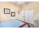 Bright bedroom with double doors and carpet at 846 N Pueblo Dr # 113, Casa Grande, AZ 85122