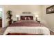 Serene bedroom with a double bed, nightstands, and ample light at 846 N Pueblo Dr # 113, Casa Grande, AZ 85122