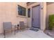 Front entry with seating area and door at 846 N Pueblo Dr # 113, Casa Grande, AZ 85122
